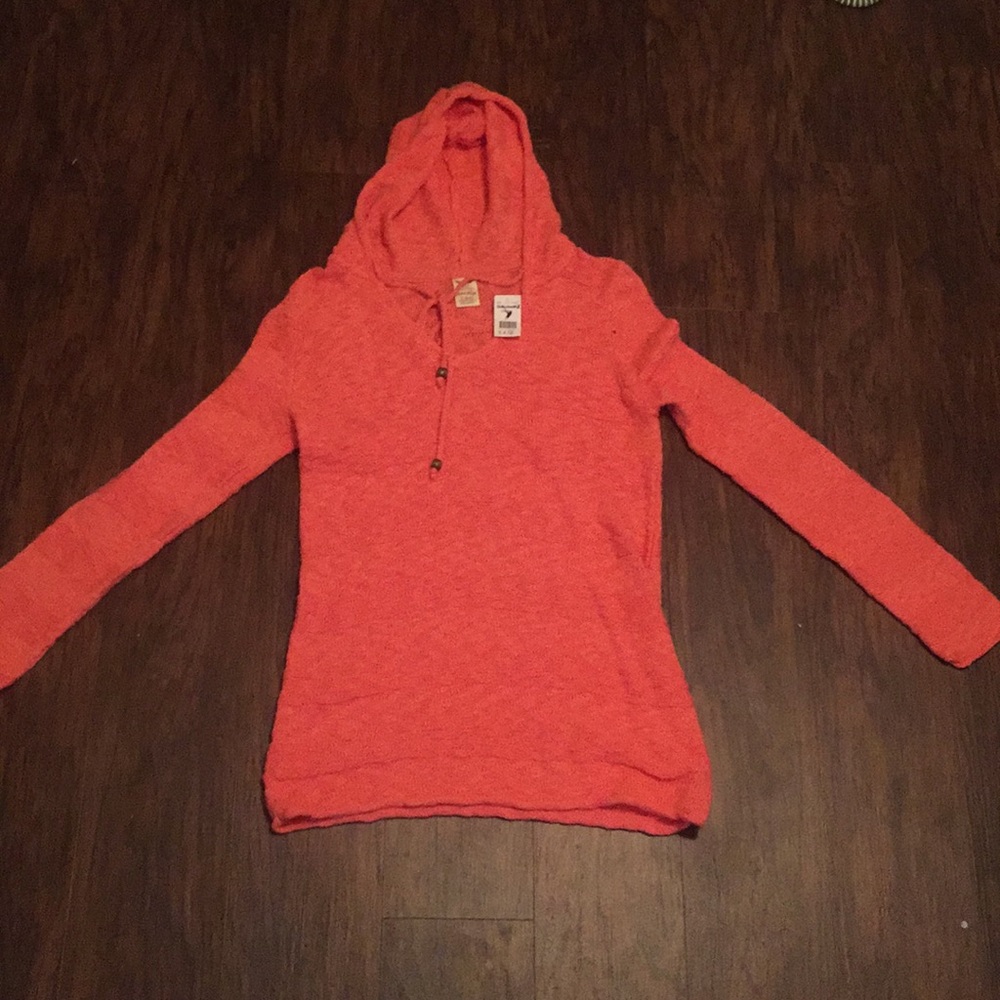 Peach colored sweater